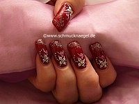 Fingernail motif with glitter-powder and nail art bouillons