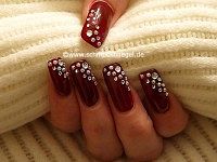 Nail art motif with half pearls and strass stones