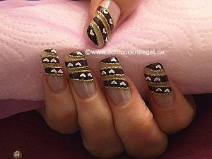 Nail art heart shapes for a fingernail motif