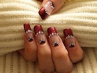 Decorated fingernails with strass stones
