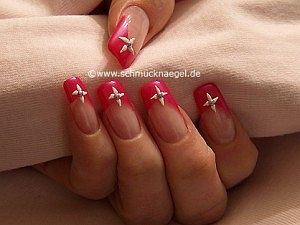 Nail art motif with half pearls and nail lacquer