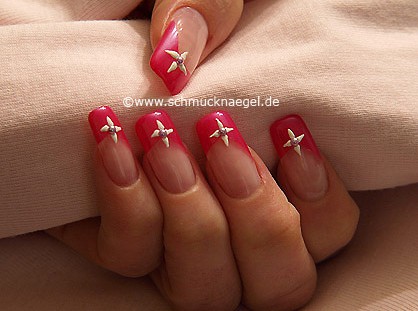 Nail art motif with half pearls and nail lacquer