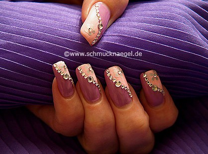 Nail art with strass stones and nail sticker