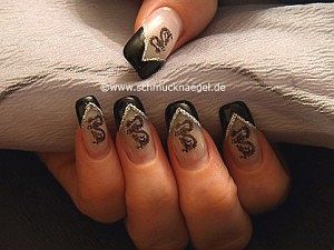 Dragon nail tattoo as fingernail motif