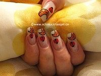 Ladybird as fingernail motif with nail art liner