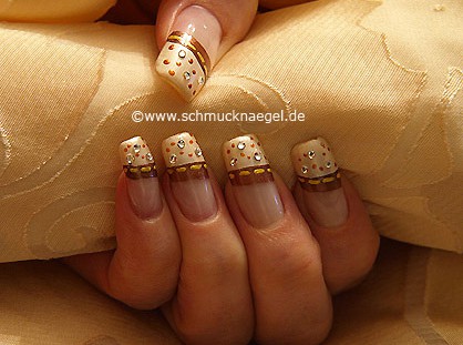 Create nails with nail lacquer and strass stones