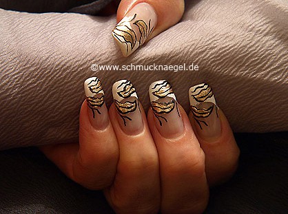 Autumn motif with leaves in the colours gold, black and white