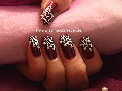 Half pearls and strass stone for the nail art motif