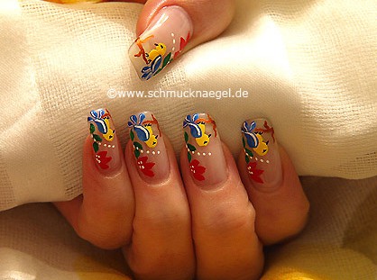 Bird as fingernail motif with nail lacquer
