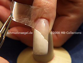 Pinzette und durchsichtiges Klebeband