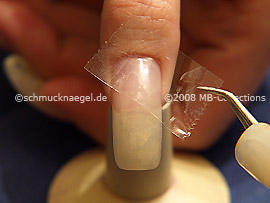 Durchsichtige Klebeband und Pinzette