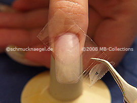 Durchsichtige Klebeband und Pinzette