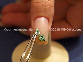 Fimo-Frucht und die Pinzette