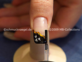 Al fin utilice el esmalte transparente