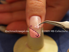 Mariposa tridimensional y pinzeta