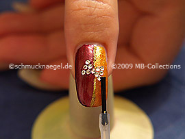 Al fin utilice el esmalte transparente