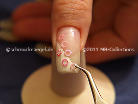 Nail art glitter hexágono en rosa