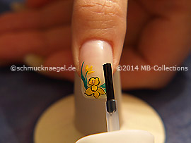 Al fin utilice el esmalte transparente