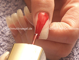 Nail polish in the colour red