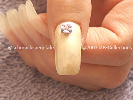 Ceramic floret and tweezers