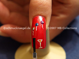 The clear nail lacquer protects the nail art
