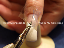 Tweezers and clear adhesive tape