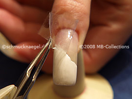 Tweezers and clear adhesive tape