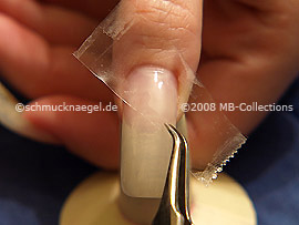 Clear adhesive tape and tweezers