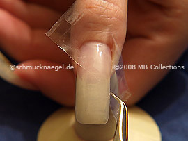 Clear adhesive tape and tweezers
