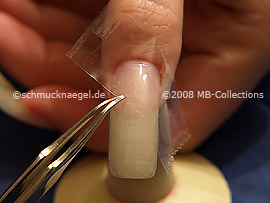 Clear adhesive tape and tweezers
