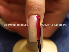 Nail lacquer in the colour claret-red