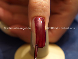 Nail lacquer in the colour claret-red