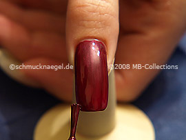 Nail lacquer in the colour claret-red