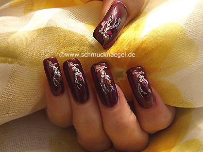 Art nails in claret-red and silver-glitter