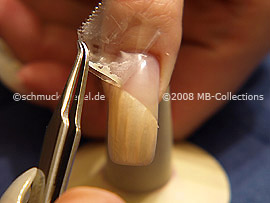 Tweezers and clear adhesive tape