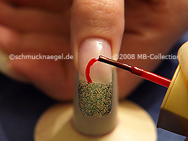 Nail lacquer in the colour red