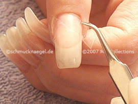 Tweezers and the clear adhesive tape
