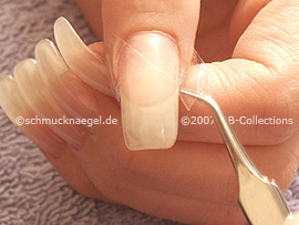 Tweezers and the clear adhesive tape