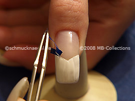 V-shaped French manicure template and tweezers