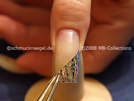 Hologram foil in silver and tweezers