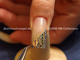 Hologram foil in silver and tweezers