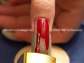 Nail lacquer in the colour red