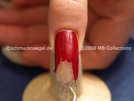 Nail lacquer in the colour red