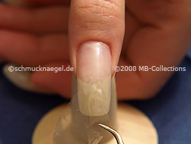 Clear adhesive tape and tweezers