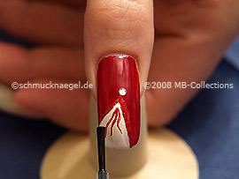 The clear nail lacquer protects the nail art