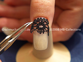 Lace border and the tweezers