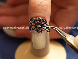 Lace border and the tweezers
