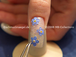 Dry flowers and tweezers