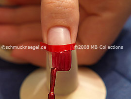 Nail lacquer in the colour dark red