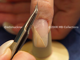 Tweezers and clear adhesive tape